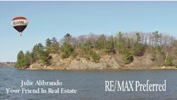 Lake Redstone water and shoreline in a photograph from Julie's own website
